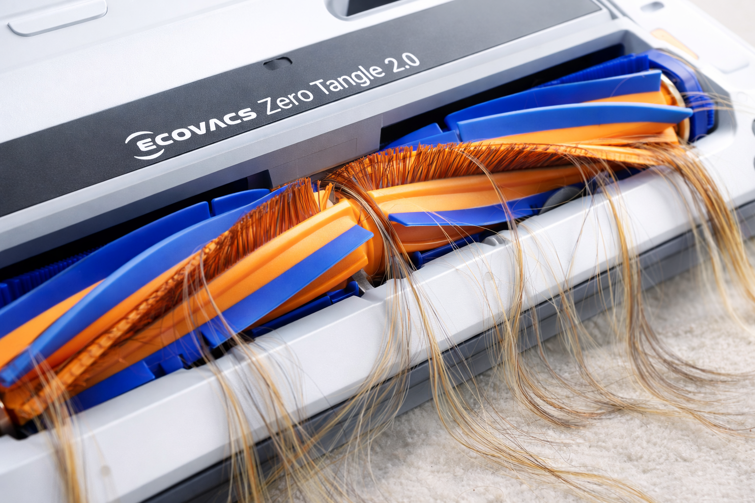 Close-up of ECOVACS Zero Tangle 2.0 brush system removing hair without tangling